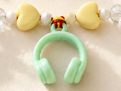 BeYoou.Bling Handcrafted Green Headphones Charm Rakhi