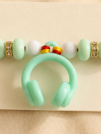 BeYoou.Bling Handcrafted Mint Green Headphone Rakhi with Beaded Accents