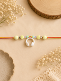 BeYoou.Bling Handcrafted Cute White Headphone & Heart Beaded Rakhi for Brother