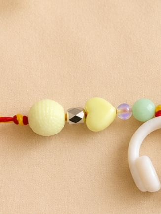 BeYoou.Bling Handcrafted Cute White Headphone & Heart Beaded Rakhi for Brother